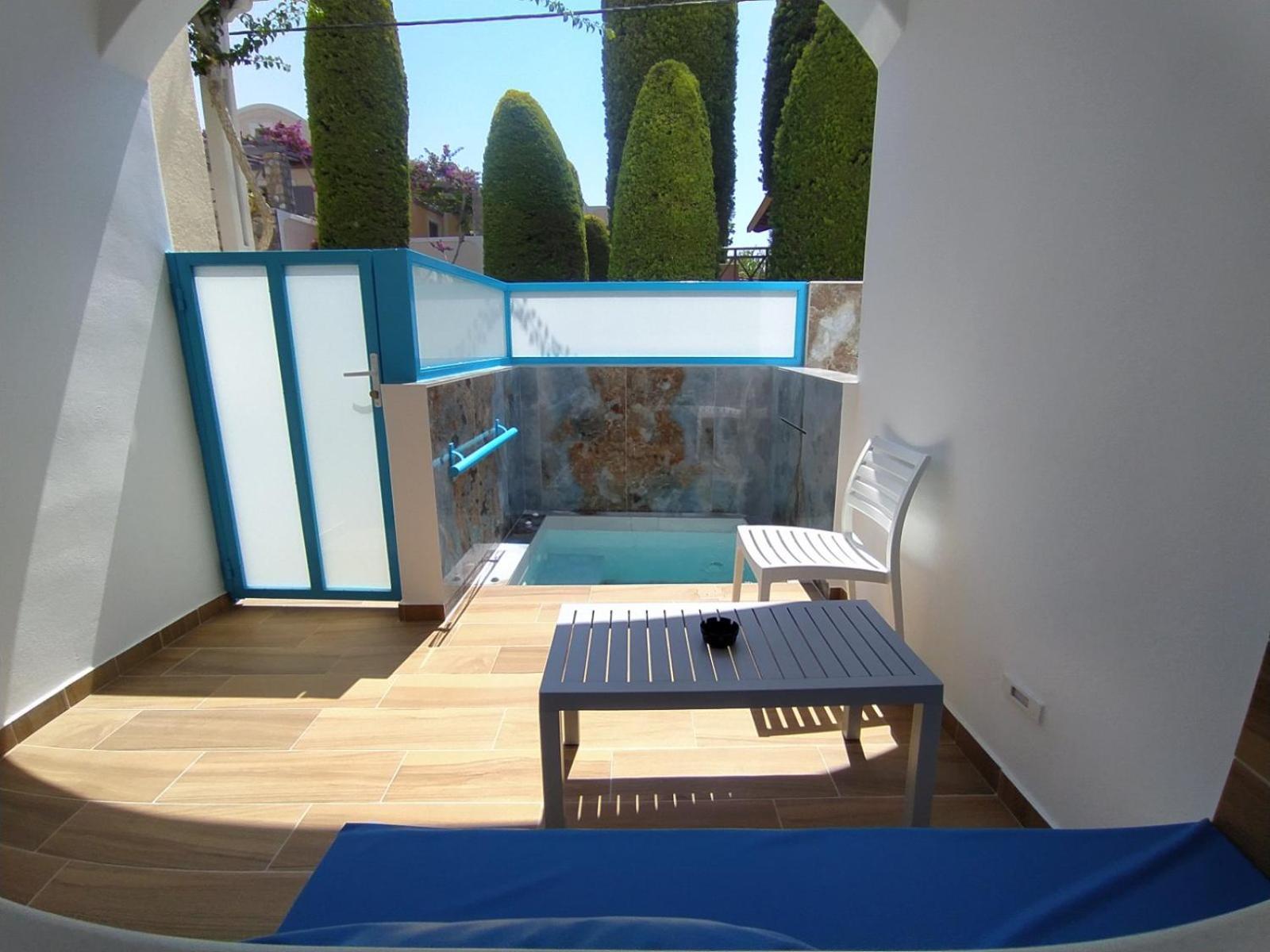 Chariot Apartments Santorini Kamári Quarto foto
